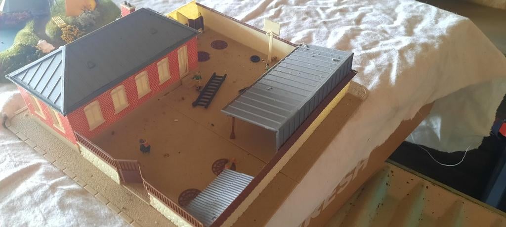 Schoolgebouwen en windmolen, Ophalen