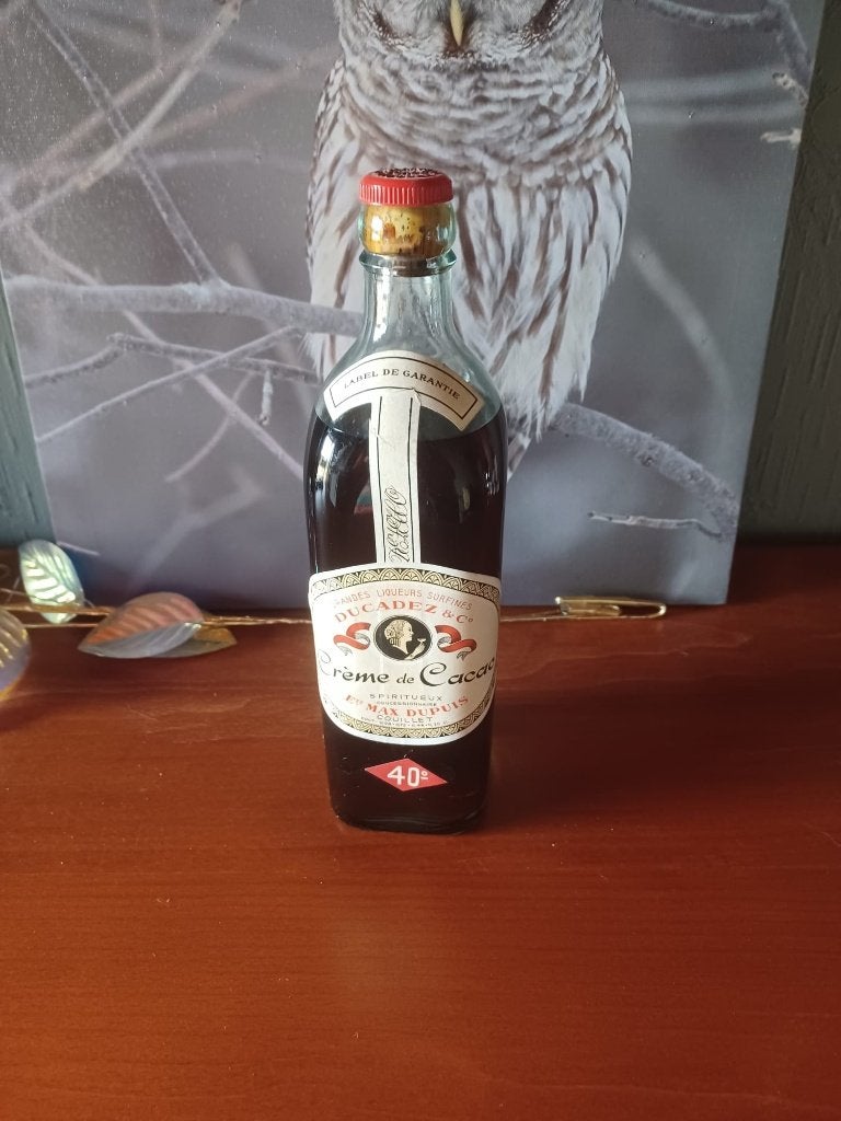 Bouteille vintage de crème de cacao Ducadez & Co (40 %), Collections, Vins, Enlèvement ou Envoi, Neuf, Autres types, Pleine