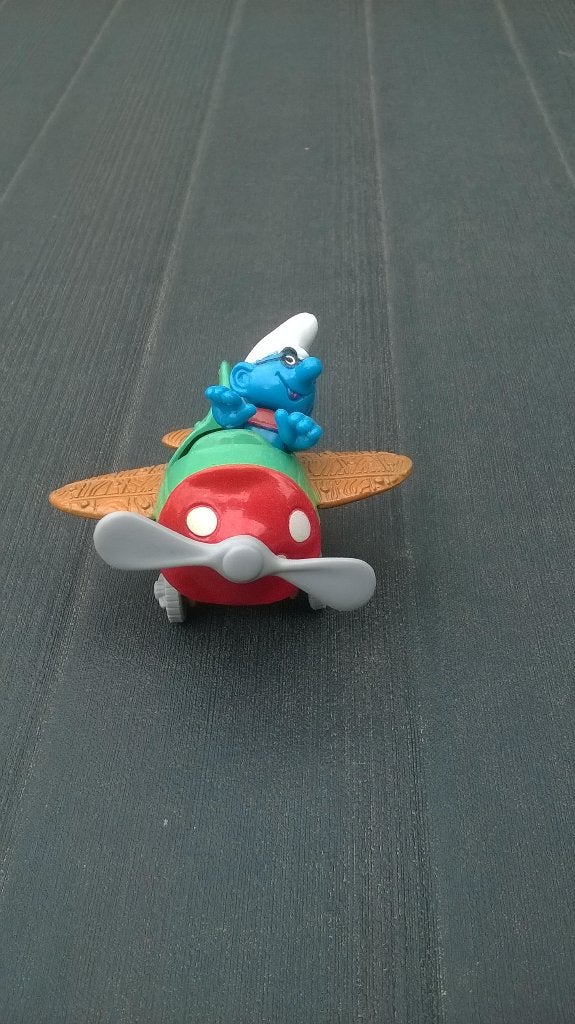 Smurf in vliegtuig – Toy Island, Verzamelen, Smurfen, Ophalen of Verzenden, Gebruikt, Overige Smurfen, Poppetje, Figuurtje of Knuffel