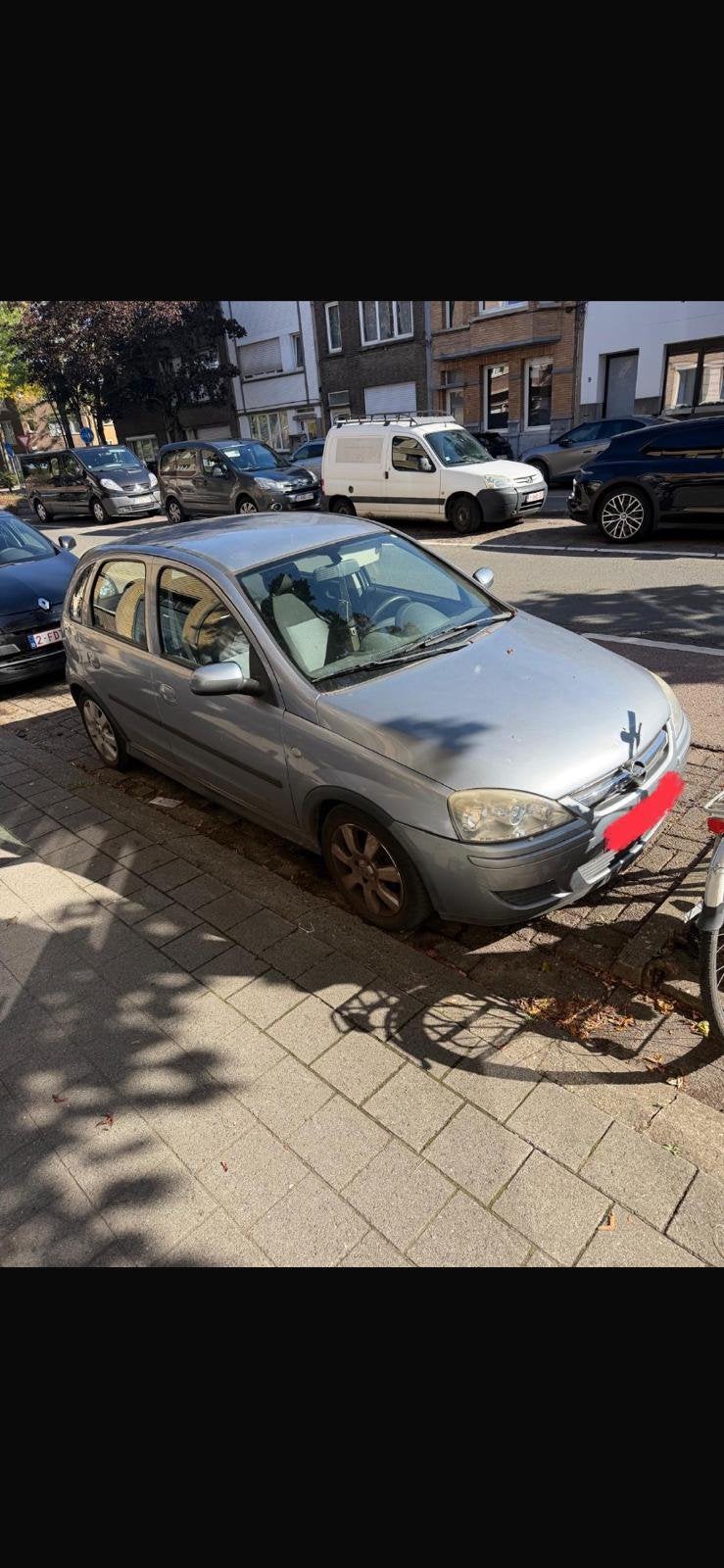 Opel Corsa 1.2 benzine twinport, Voorwielaandrijving, Stof, Zwart, Blauw