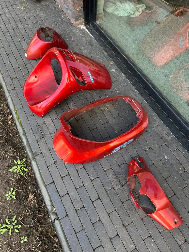 Piaggio zip type 2 kappenset orgineel, Ophalen