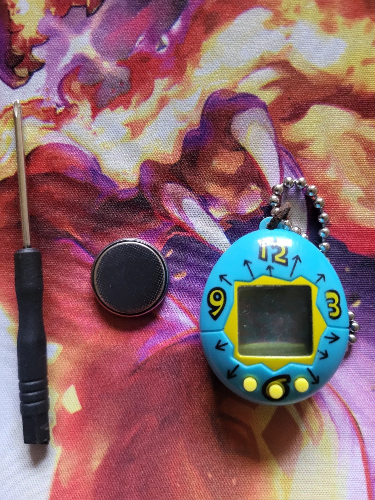 tamagochi avec batterie neuve et tournevis., Enlèvement ou Envoi