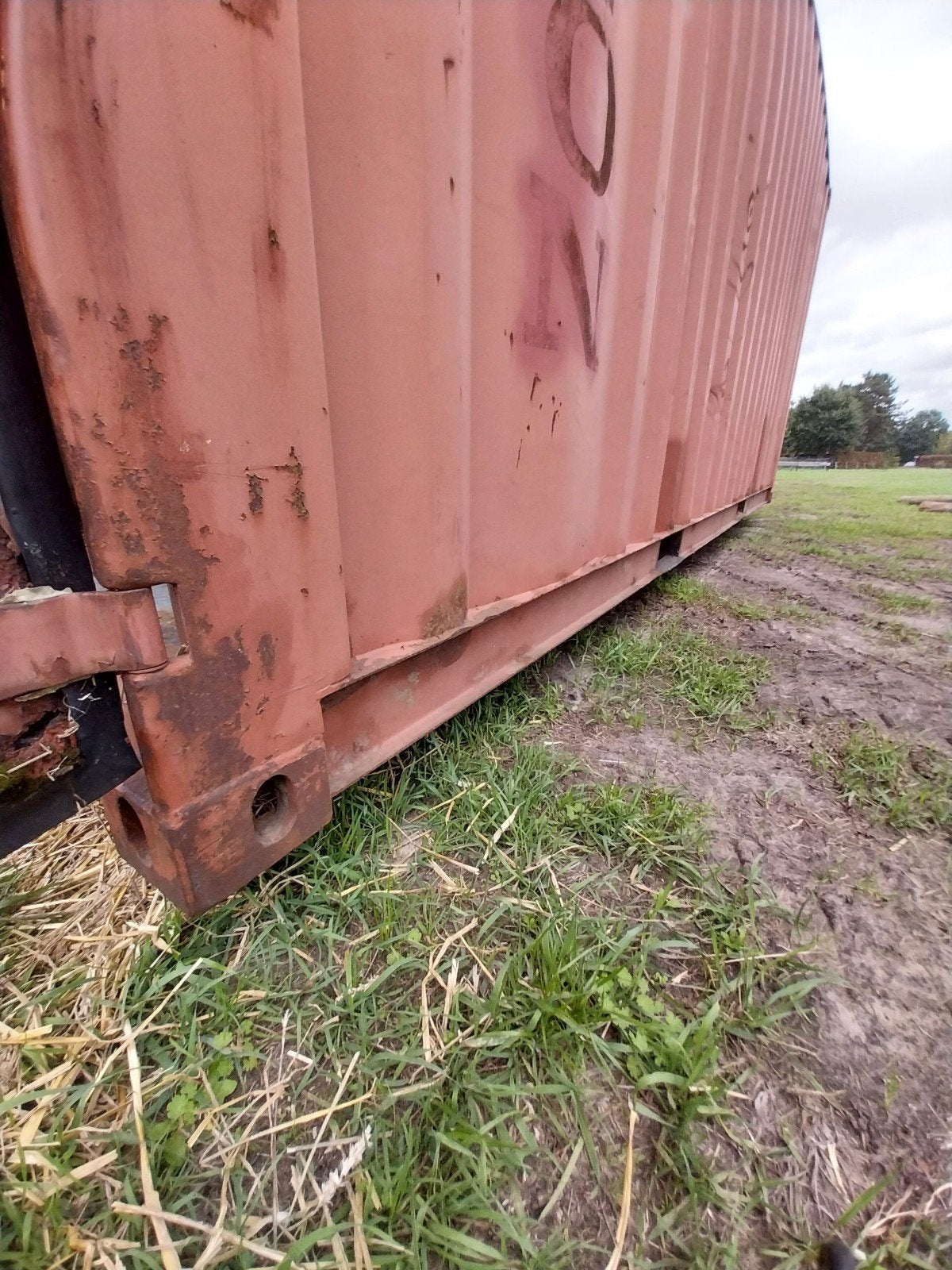 20 voet zeecontainer met haaksysteem, Ophalen