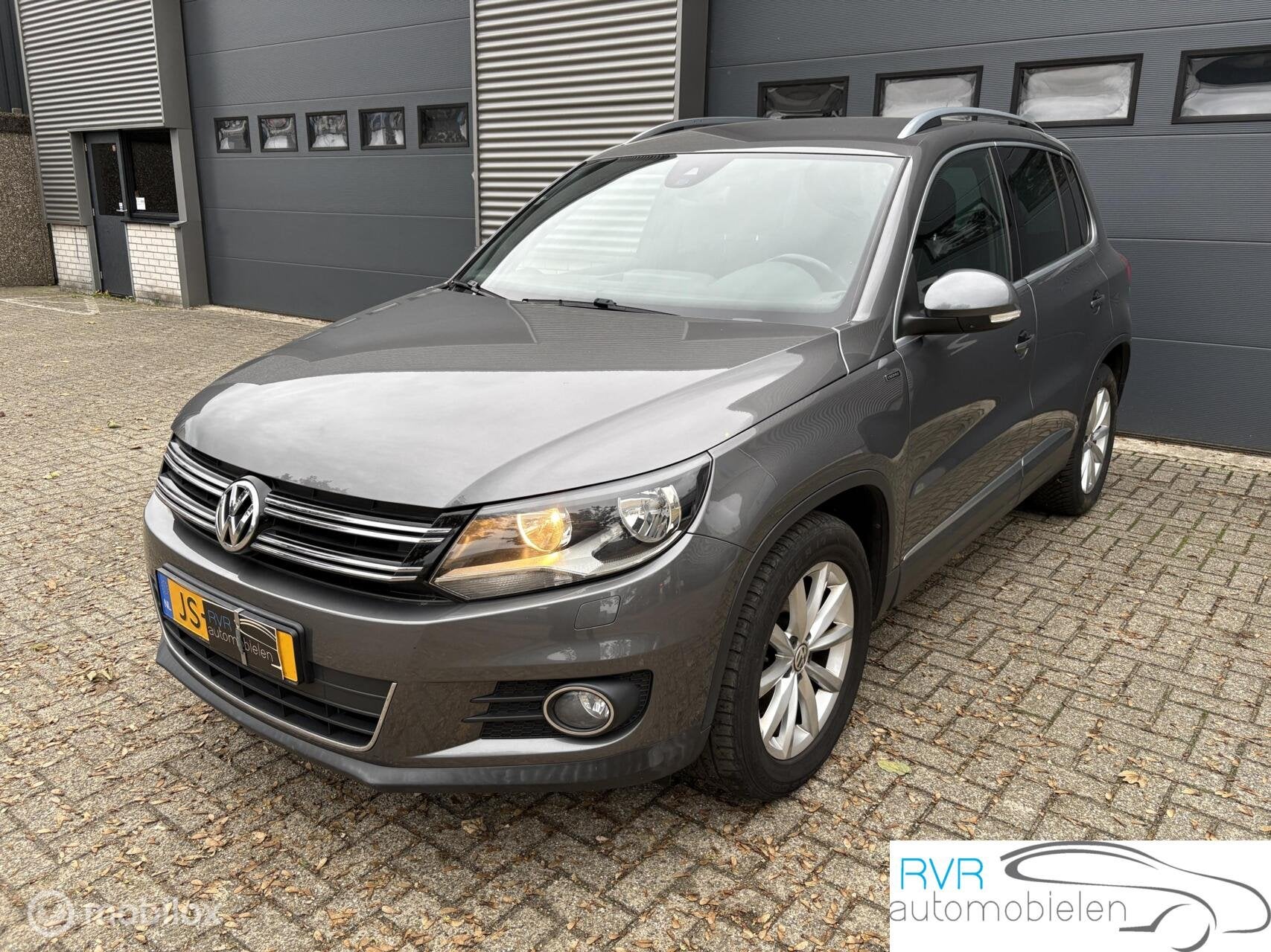 Volkswagen Tiguan 1.4 TSI Sport&Style LEES ADVERTENTIE!, Autos, Argent ou Gris, Achat, Volant multifonction, Noir