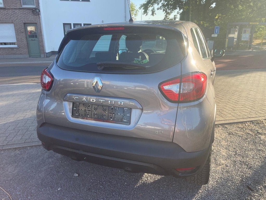 Renault Captur 1.5DCi van 08/2013 met 130000km!, Auto's, Voorwielaandrijving, Stof, Zwart, 4 cilinders