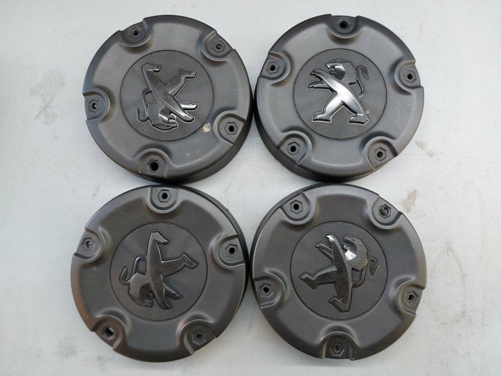 wieldeksels voor peugeot partner 5x108 en 4x108, Ophalen, Zo goed als nieuw