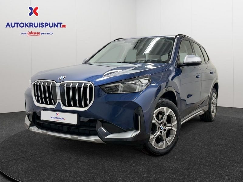 BMW X1 sDrive18i AUT, Auto's, BMW, Achterwielaandrijving, Gebruikt, Parkeersensor, Leder