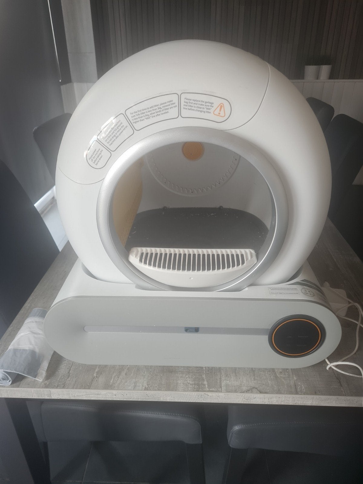 automatische kattenbak, Ophalen