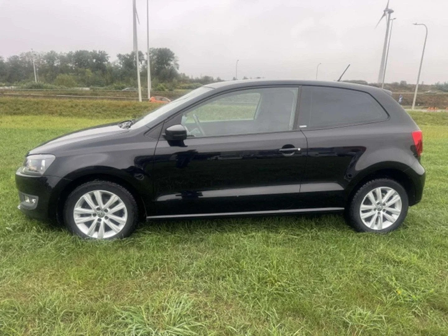 Volkswagen Polo Polo 1.2i Style / Garantie 12m. (bj 2012), Auto's, Euro 5, Stof, Gebruikt, Zwart