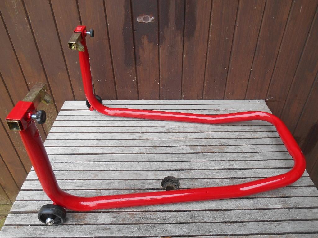 Paddockstand en inrijwielklem motor, Ophalen