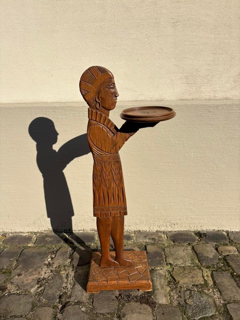 Houten art deco display, Ophalen