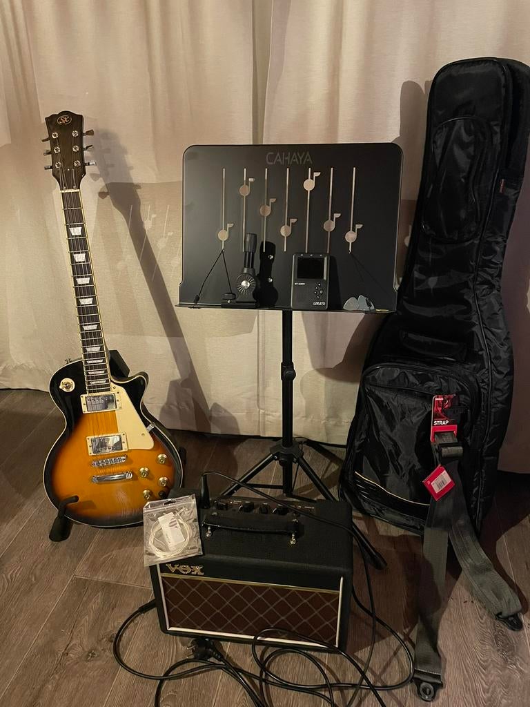 Guitare électrique + amplificateur + pied + porte partition, Musique & Instruments, Enlèvement, Comme neuf