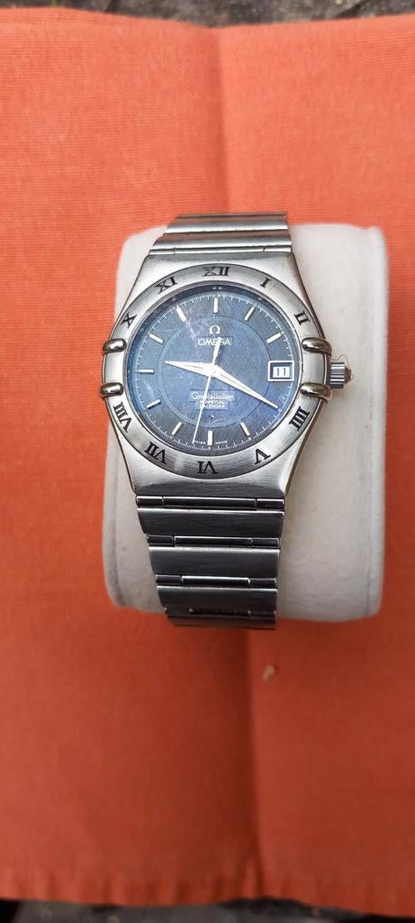 omega acier constellation calendrier perpetuel, Bijoux, Sacs & Beauté, Enlèvement ou Envoi, Acier, Utilisé, Omega