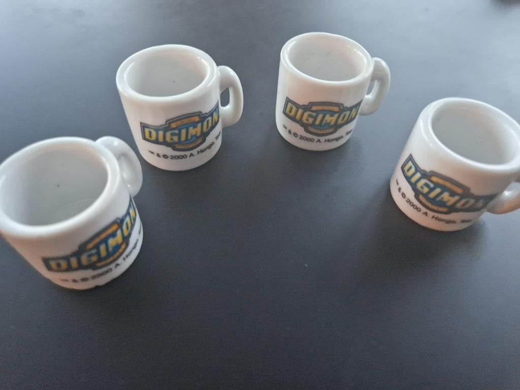 Digimon beker , tas , zeldzaam,  kleine verzamel mugs, Games en Spelcomputers, Ophalen of Verzenden, Zo goed als nieuw
