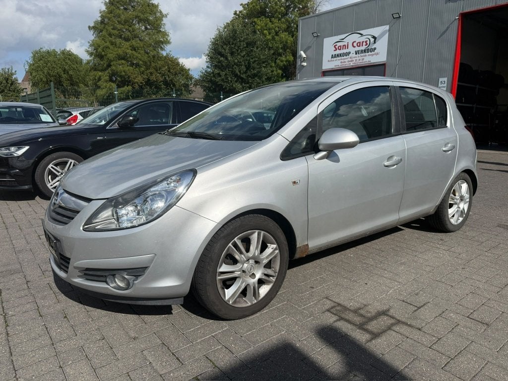 Opel Corsa 1.2 essence année 2009 112000 km bon état, Autos, Argent ou Gris, Achat, Entreprise, Boîte manuelle