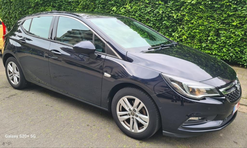 Opel Astra+ Turbo Ecotec Innovation, Auto's, Opel, Voorwielaandrijving, Blauw, Leder en Stof, Bedrijf