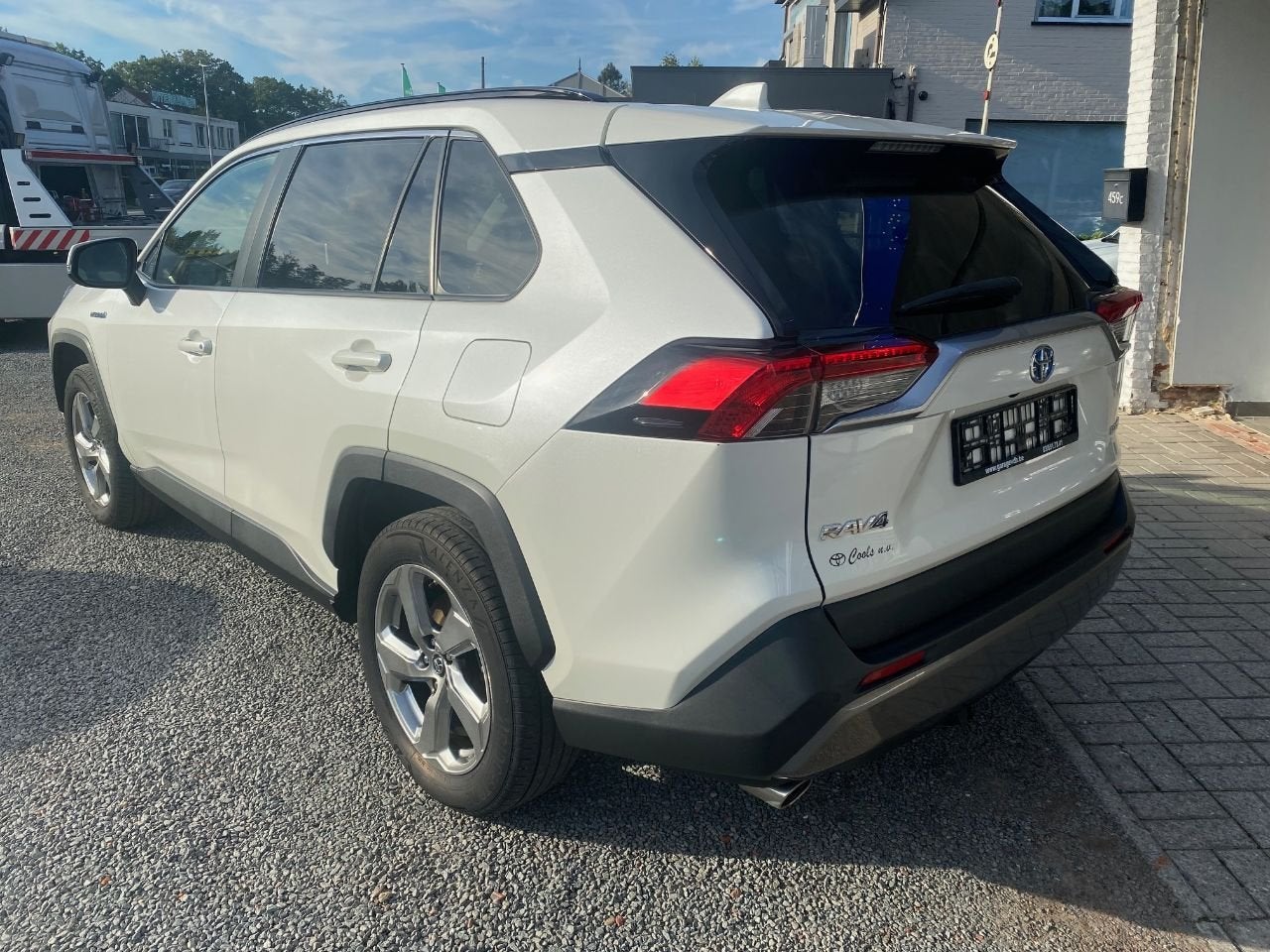 Toyota RAV4 Hybrid 4x4 STYLE (bj 2019, automaat), Auto's, Stof, Gebruikt, Euro 6, 2487 cc
