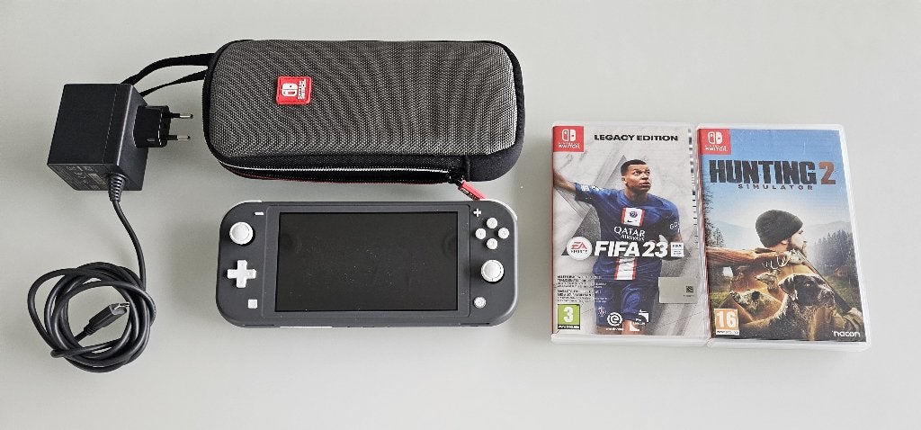 Switch Lite console met 2 spelletjes en opbergtas, Ophalen of Verzenden