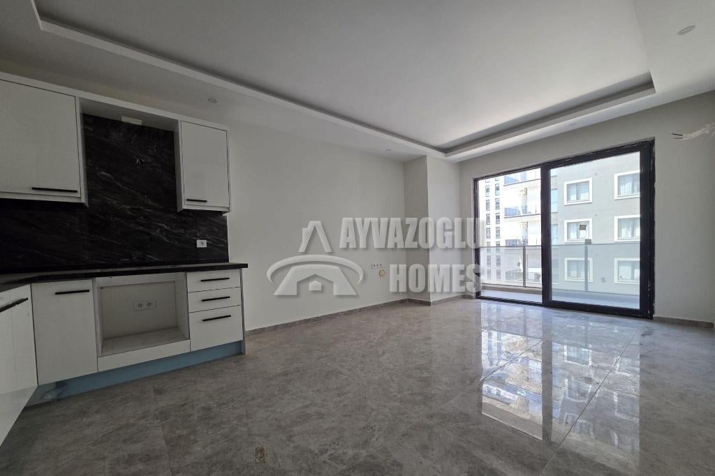 Modern 1+1 appartement met veel voorzieningen, Immo, Buitenland, 55 m², 2 kamers, Turkije, Stad