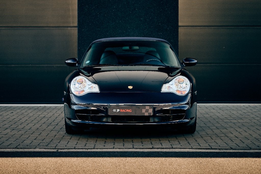 Porsche 996 Carrera 4 cabrio tiptronic 3,6 (320Pk), Auto's, Xenon verlichting, Cabriolet, Blauw, Leder