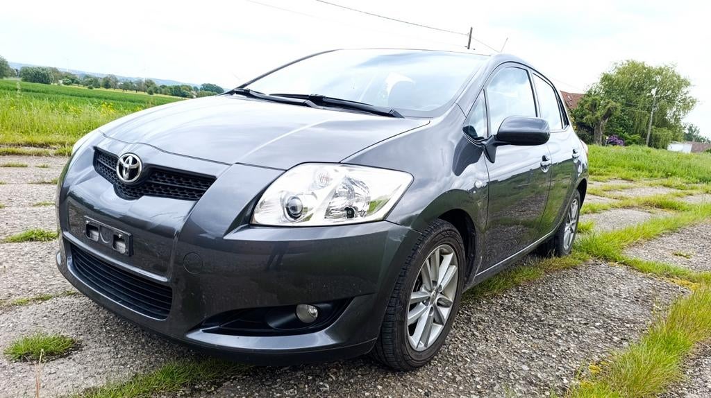 Toyota Auris 1.4 E Belgische auto 0484900222 PremierMain Oct, Auto's, Stof, Zwart, 4 cilinders, Bedrijf