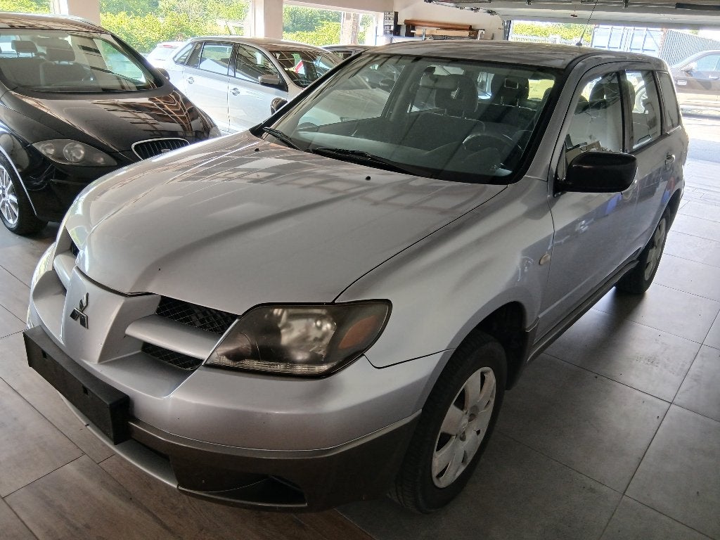 MITSUBISHI OUTLANDER 2.0 ess 2005 AIRCO/1MAIN/1.750 €, Auto's, Mitsubishi, 100 kW, Monovolume, Outlander, Bedrijf