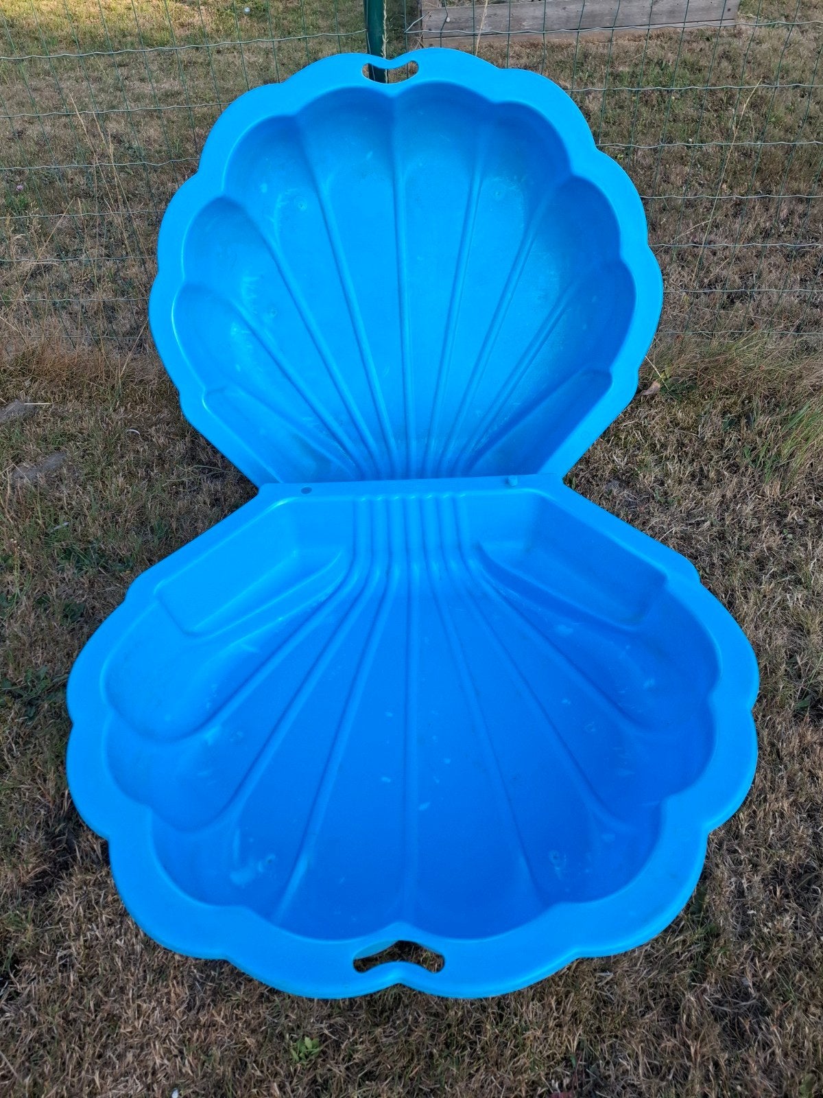 Schelp voor zand en / of water, Ophalen
