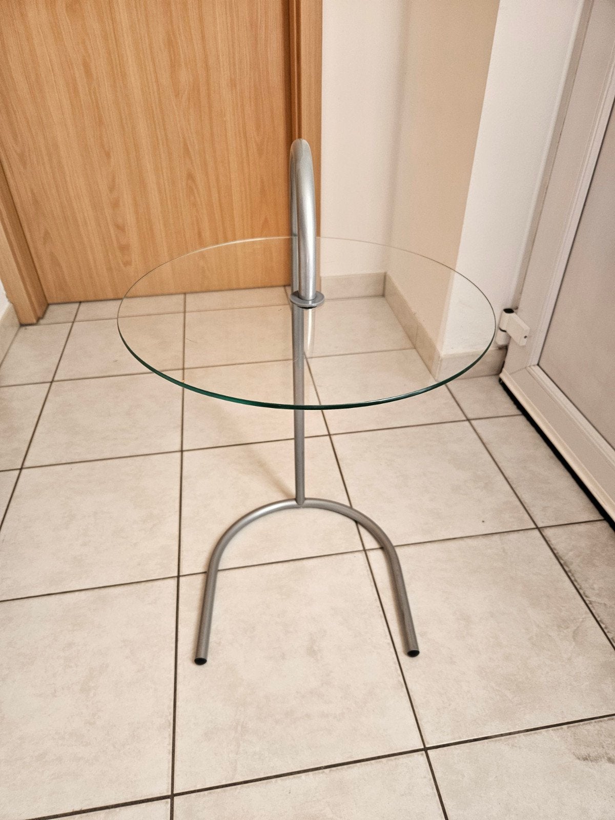 glazen bijzettafeltje, Ophalen
