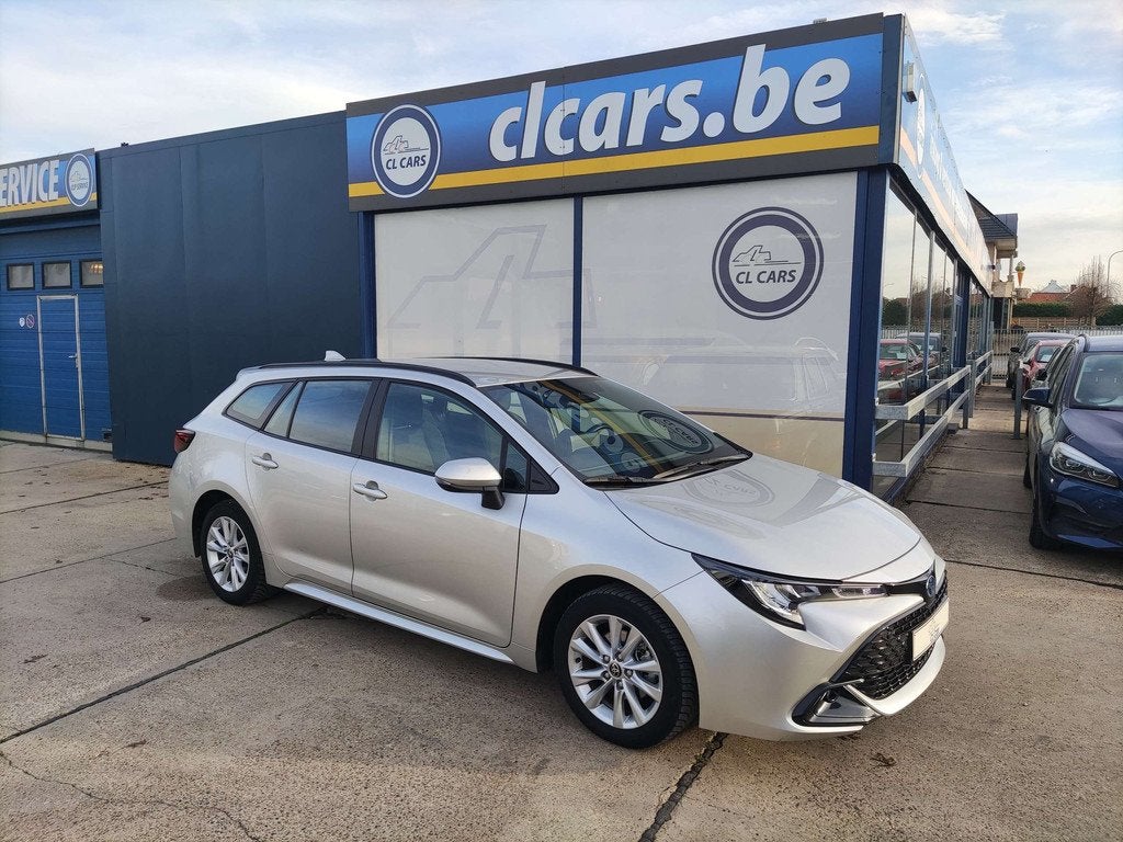 Toyota Corolla 1.8 Hybrid Touring/Automaat/Navi/Camera/Cc/Bt, Auto's, Automaat, Stof, Gebruikt, 72 kW