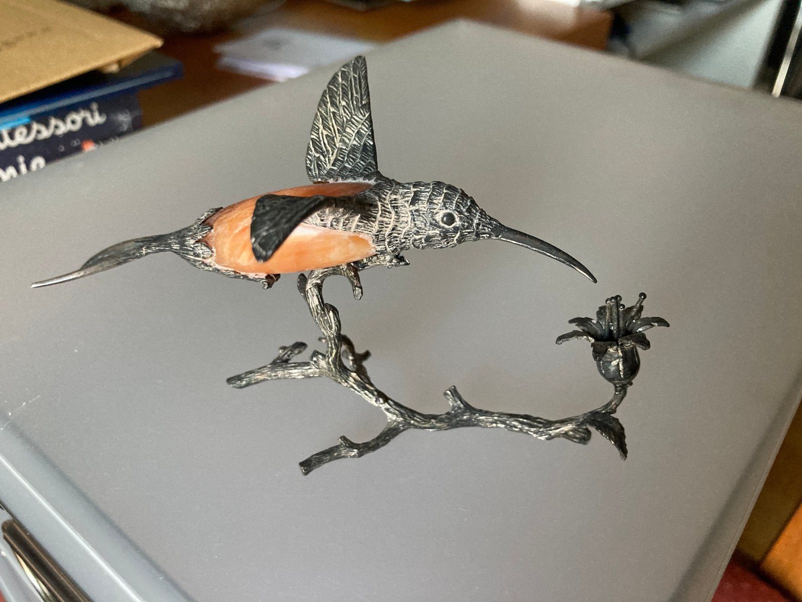 Colibri argent pierre, Enlèvement, Argent