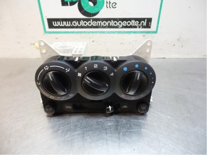 Panneau de commandes chauffage d'un Suzuki Ignis (Ignis H. 0, -, 3 mois de garantie, Utilisé, -