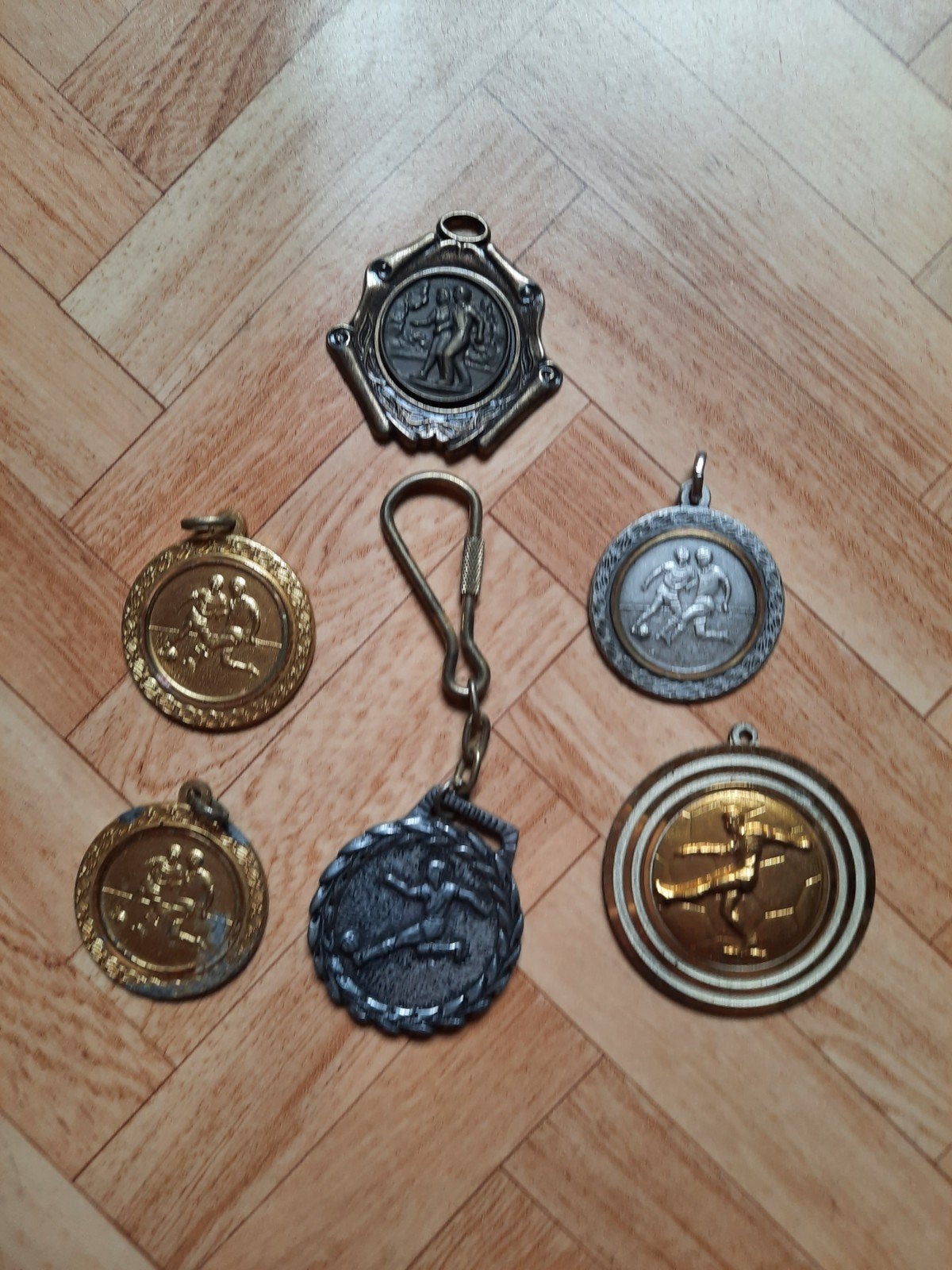 Medaille, Ophalen