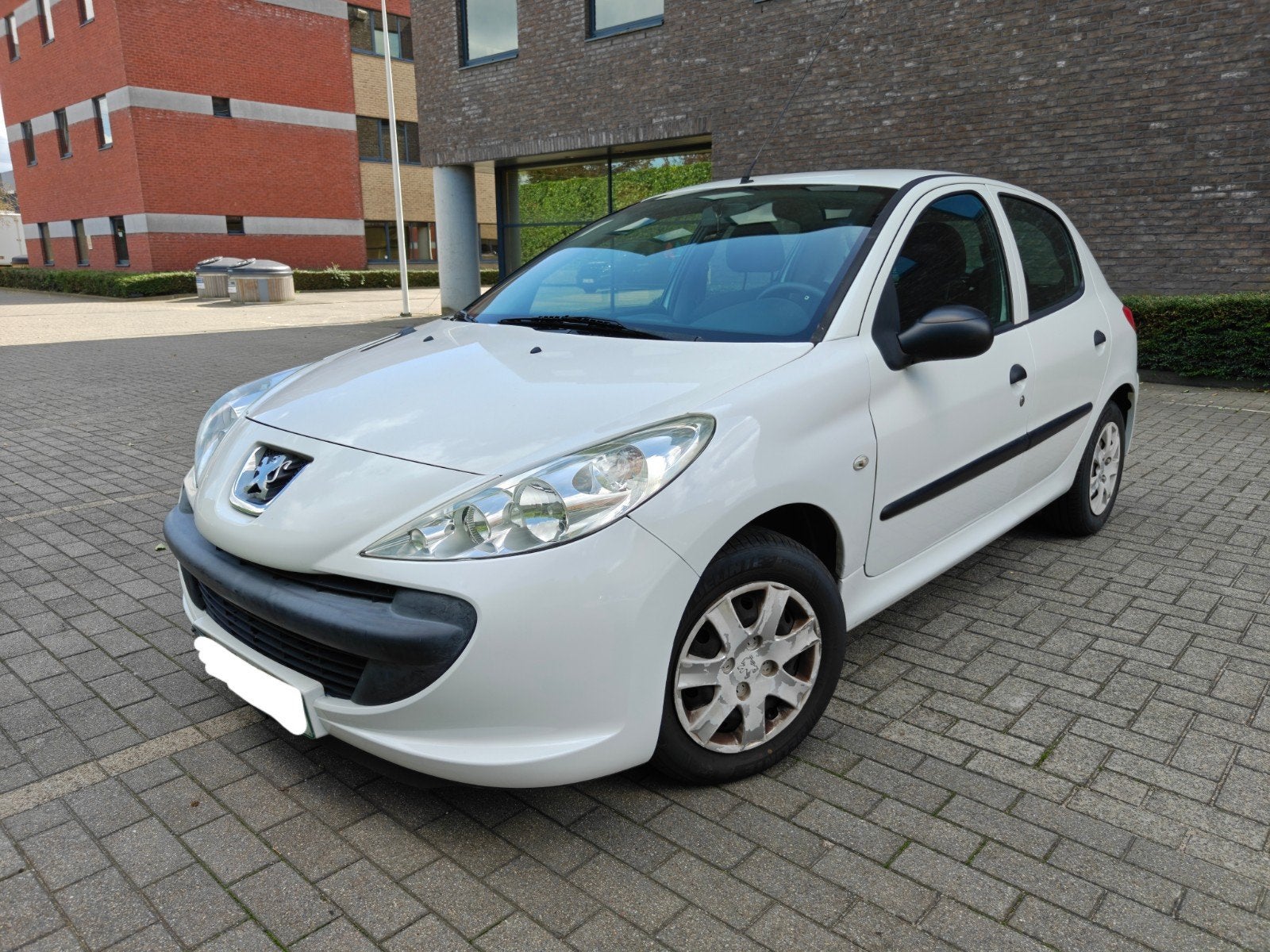 Peugeot 206+ 1.1i/ 104.000km/ 2012/Euro 5/ 1e eigenaar, Auto's, Peugeot, Stof, Zwart, Wit, Bedrijf