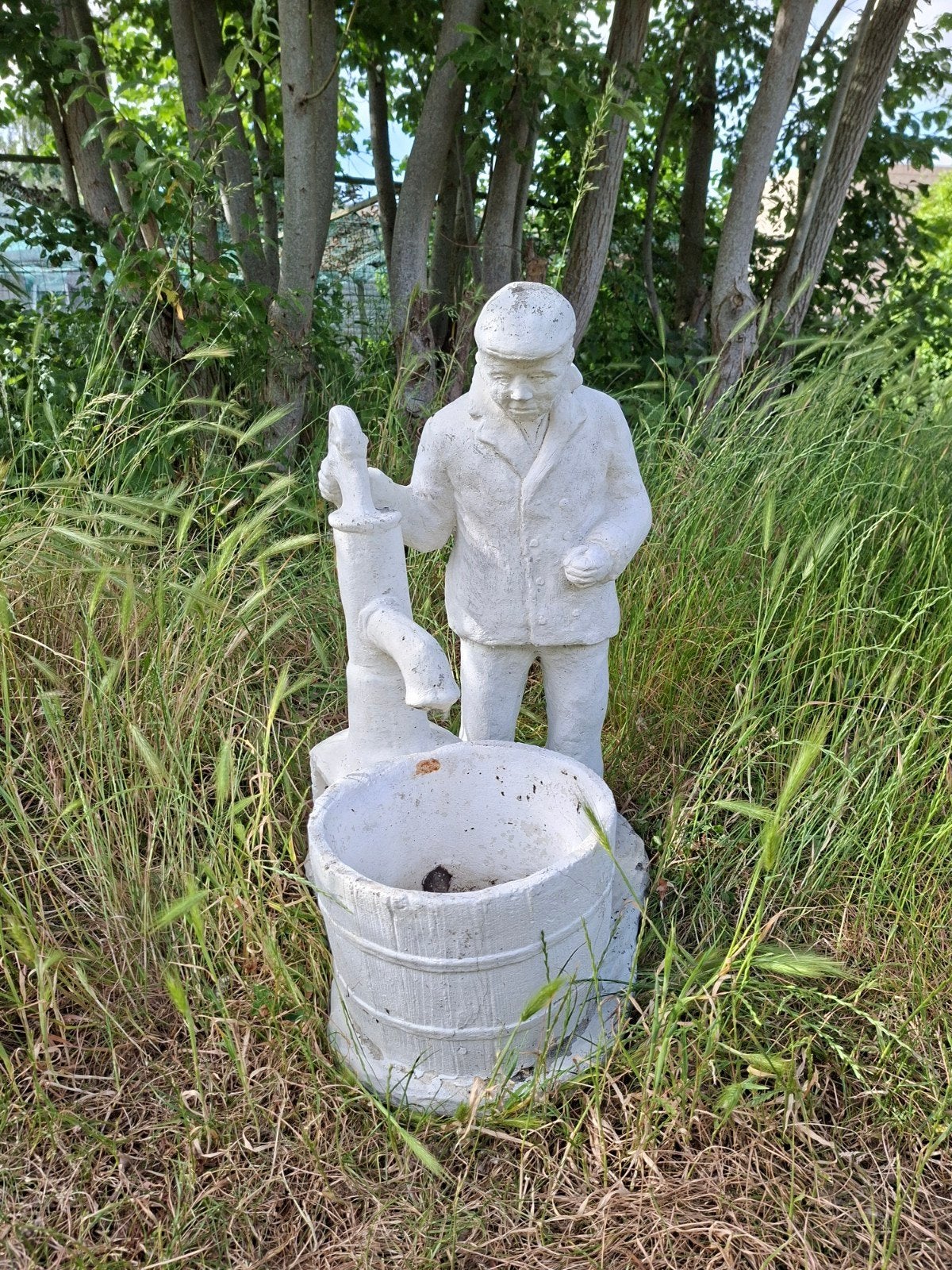 Tuinbeeld man en waterton, Ophalen