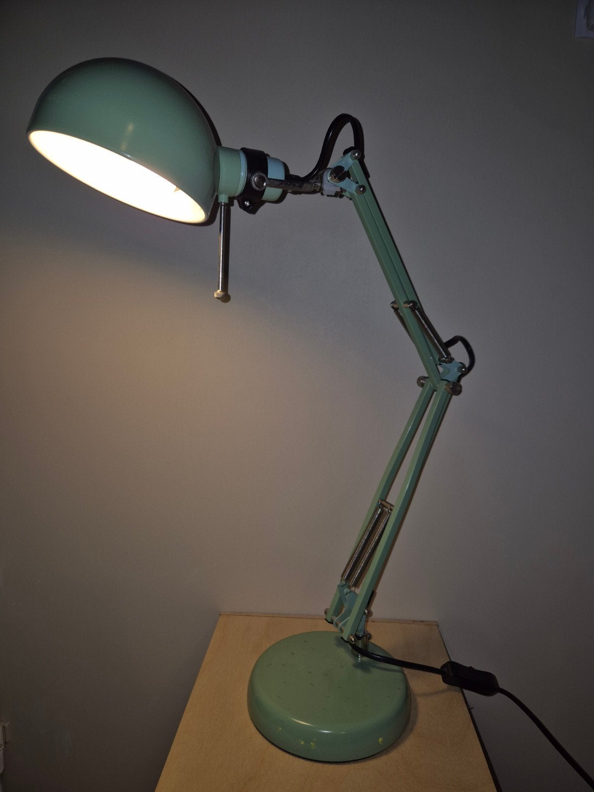 Groene bureaulamp, Ophalen