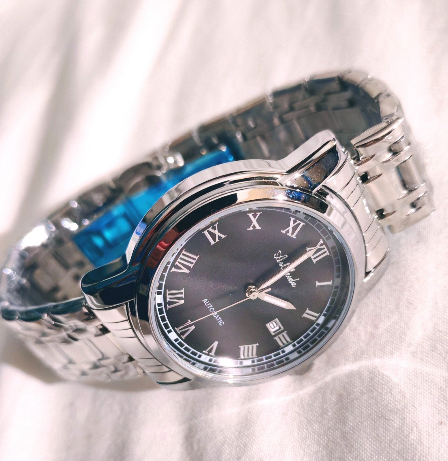 Montre automatique homme cadran noir chiffres romains, acier, Handtassen en Accessoires, Verzenden, Zilver
