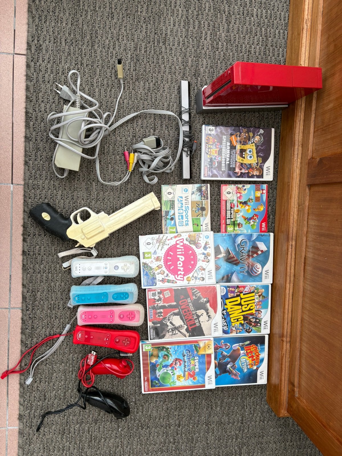 Nintendo Wii rood complete set - 4 controllers + 9 games, Ophalen, Gebruikt, Met 3 controllers of meer, Met games