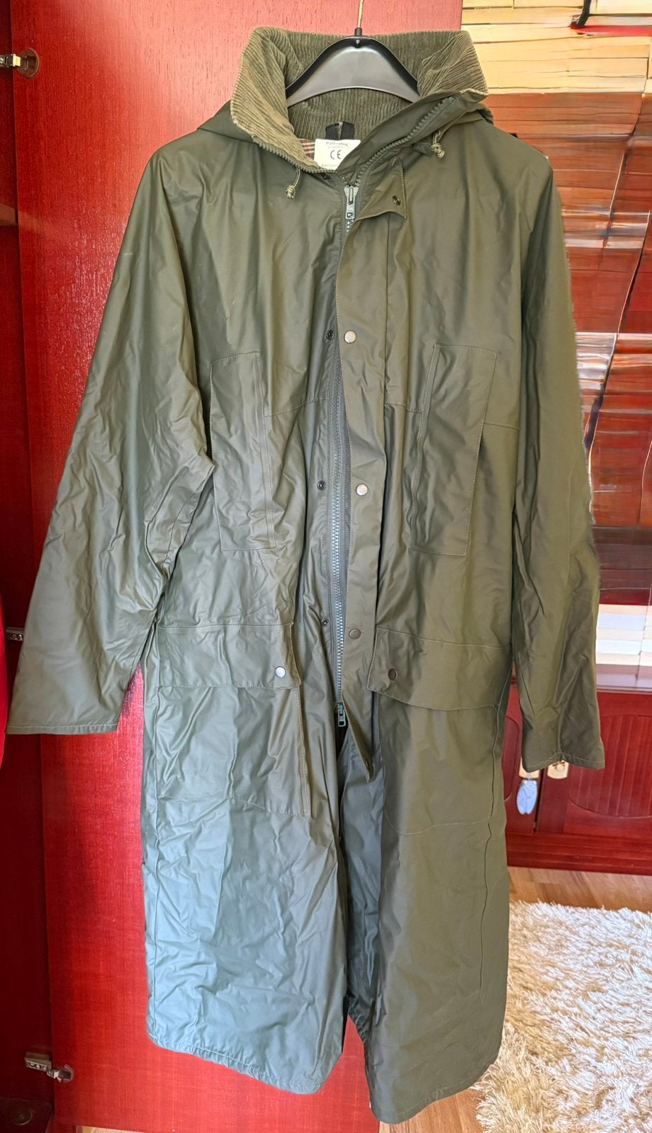 Veste de pluie, Enlèvement, Comme neuf