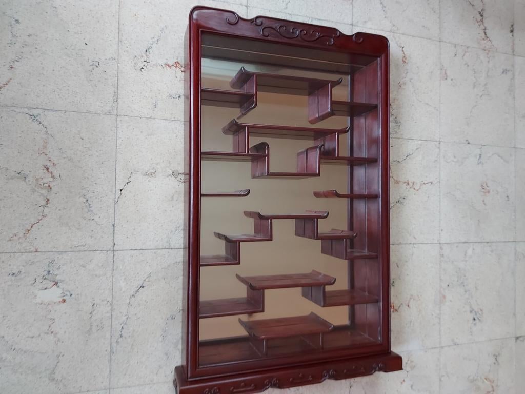muur etalage kast, Ophalen