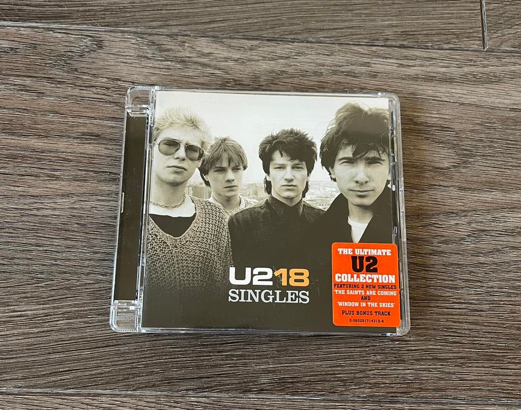 U2 - 18 Singles (ultimate U2 collection) CD perfecte staat, Ophalen of Verzenden, Zo goed als nieuw, Poprock