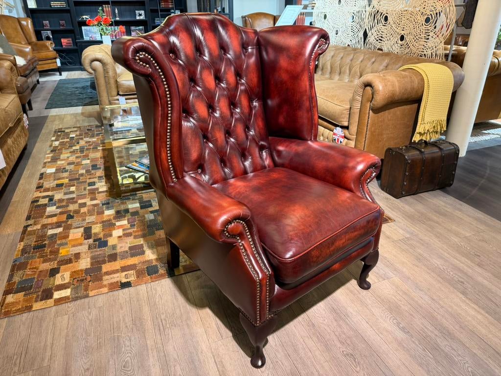 Originele Springvale Chesterfield oorfauteuil Oxblood rood, Antiek en Kunst, Ophalen of Verzenden