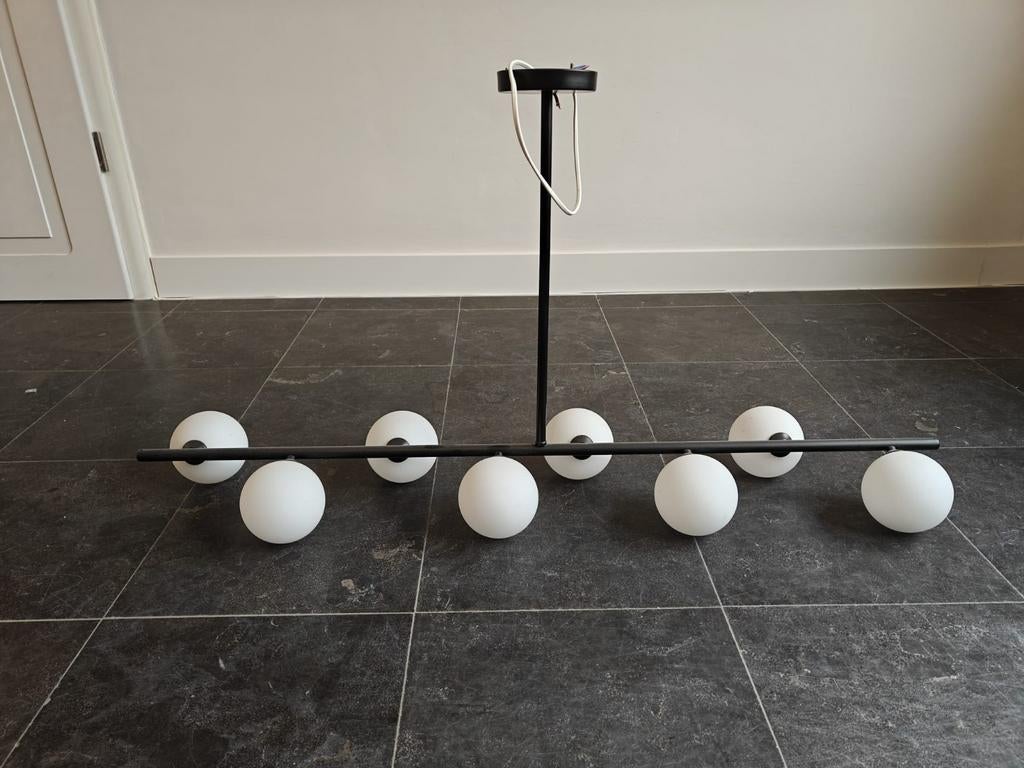 Luster lang met bollen, Ophalen