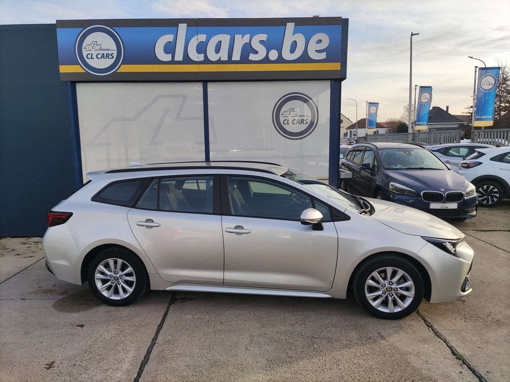 Toyota Corolla 1.8 Hybrid Touring/Automaat/Navi/Camera/Cc/Bt, Auto's, Automaat, Stof, Gebruikt, 72 kW