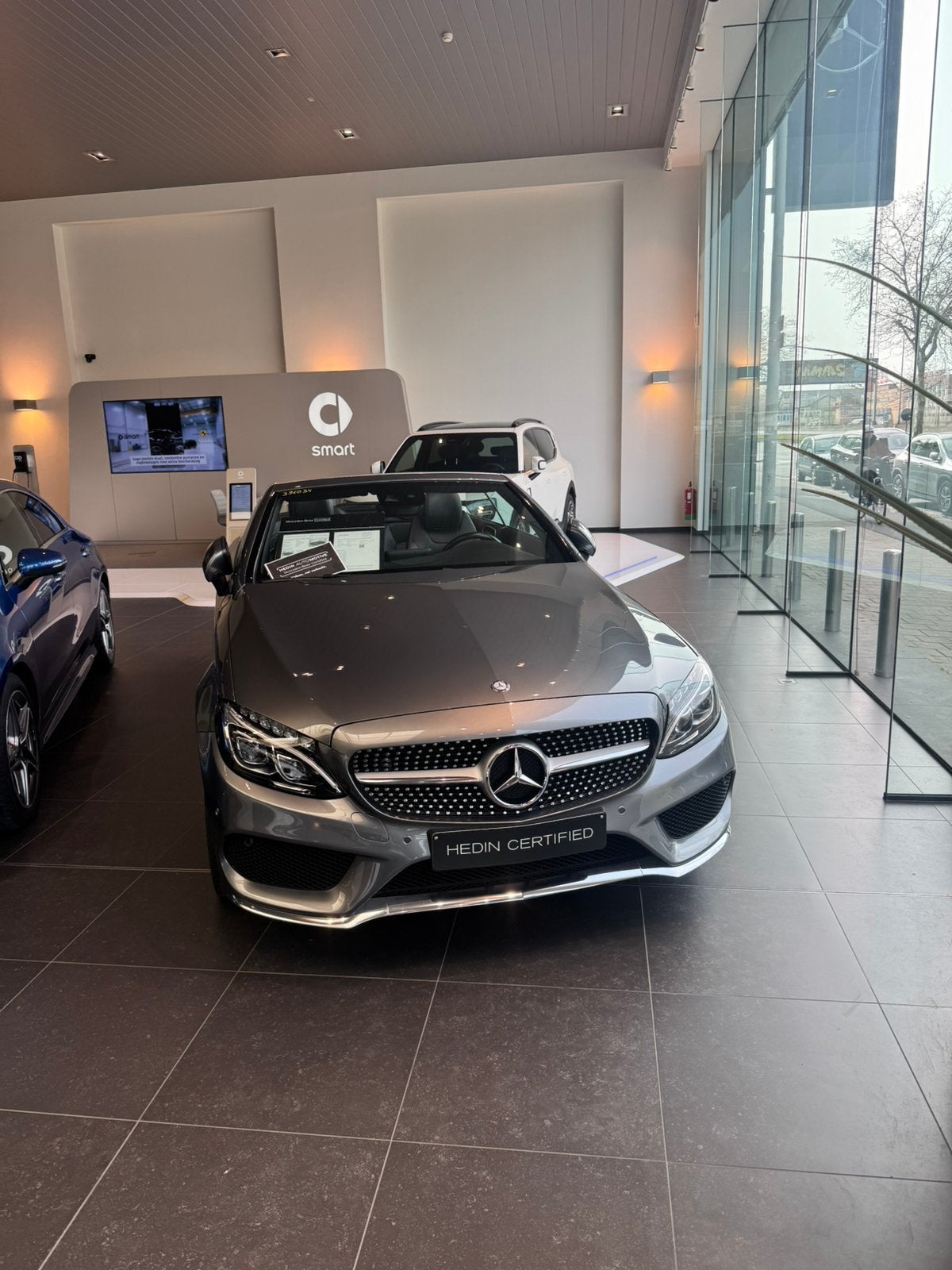 Mercedes C200 4MATIC Cabriolet AMG Line – 55.000 KM, Auto's, Mercedes-Benz, Cabriolet, Zwart, Bedrijf, Vierwielaandrijving