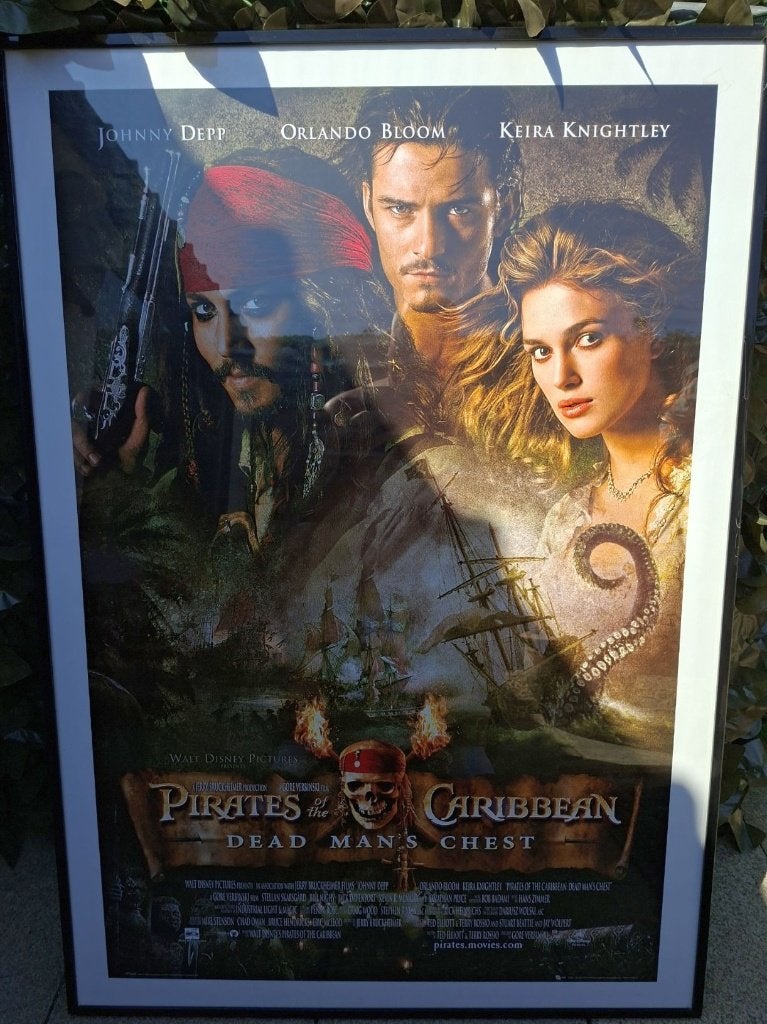 Originele filmaffiche in kader met glas, Ophalen