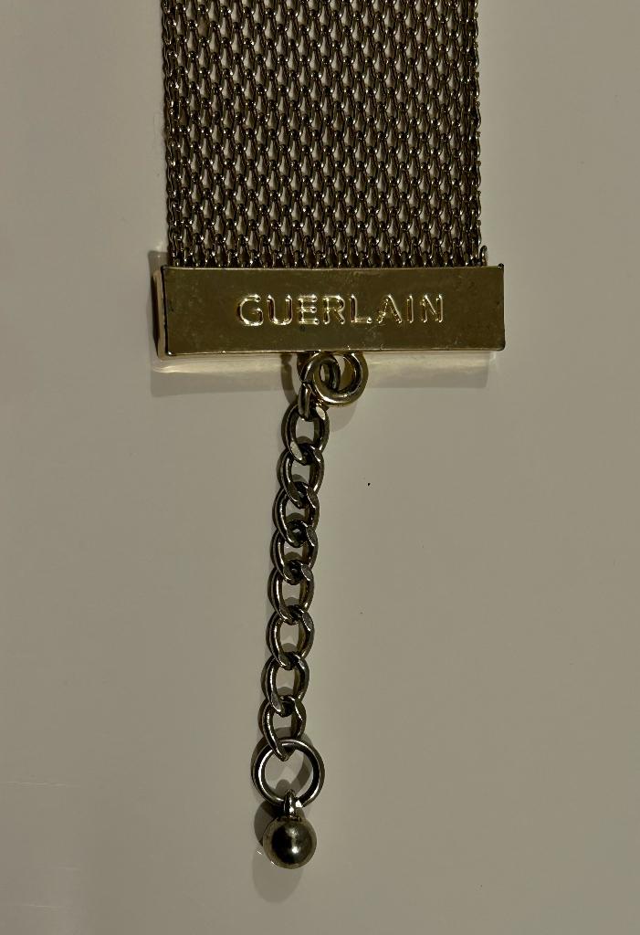Guerlain goudkleurige brede armband, Ophalen of Verzenden, Nieuw, Goud