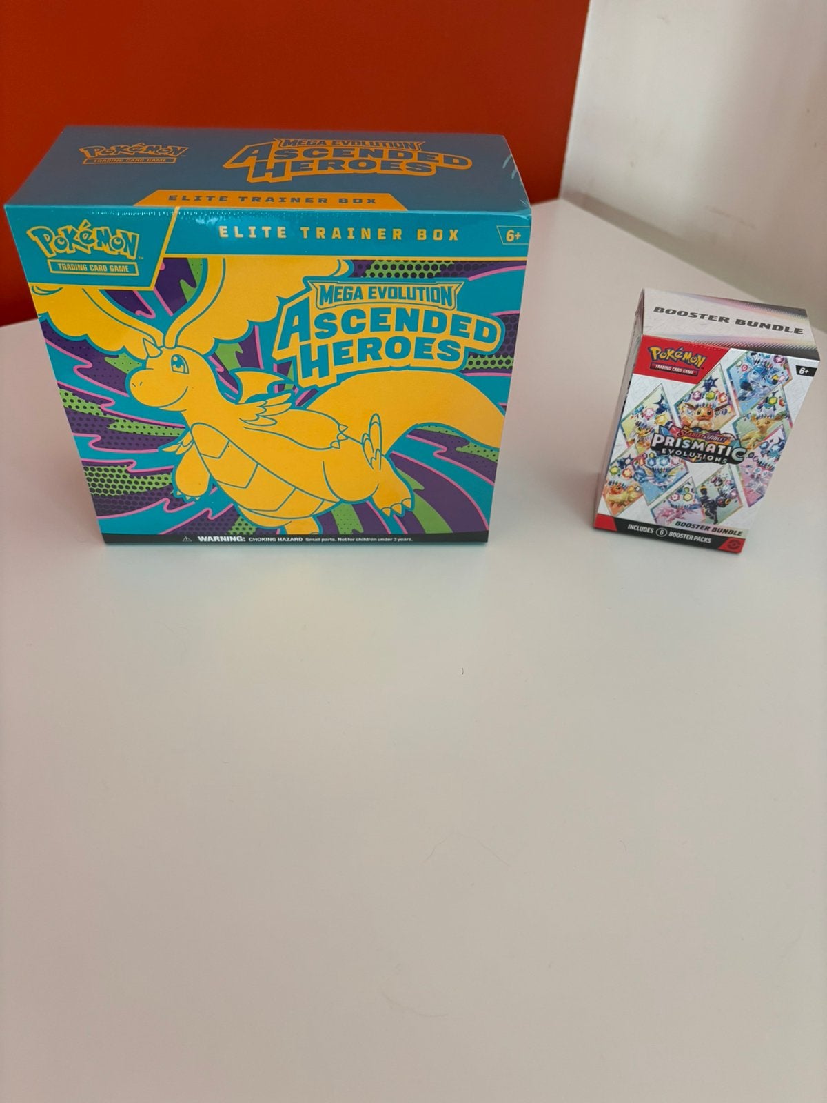Ascended heroes ETB & Prismatic evolutions bundle, Hobby en Vrije tijd, Verzamelkaartspellen | Pokémon, Ophalen of Verzenden, Zo goed als nieuw