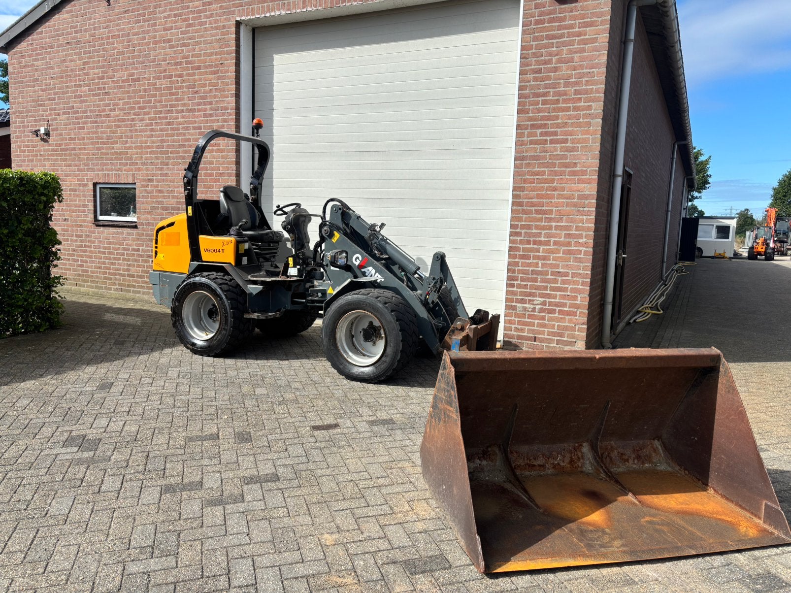 Giant V6004 T-XTRA Kniklader shovel wiellader, Enlèvement