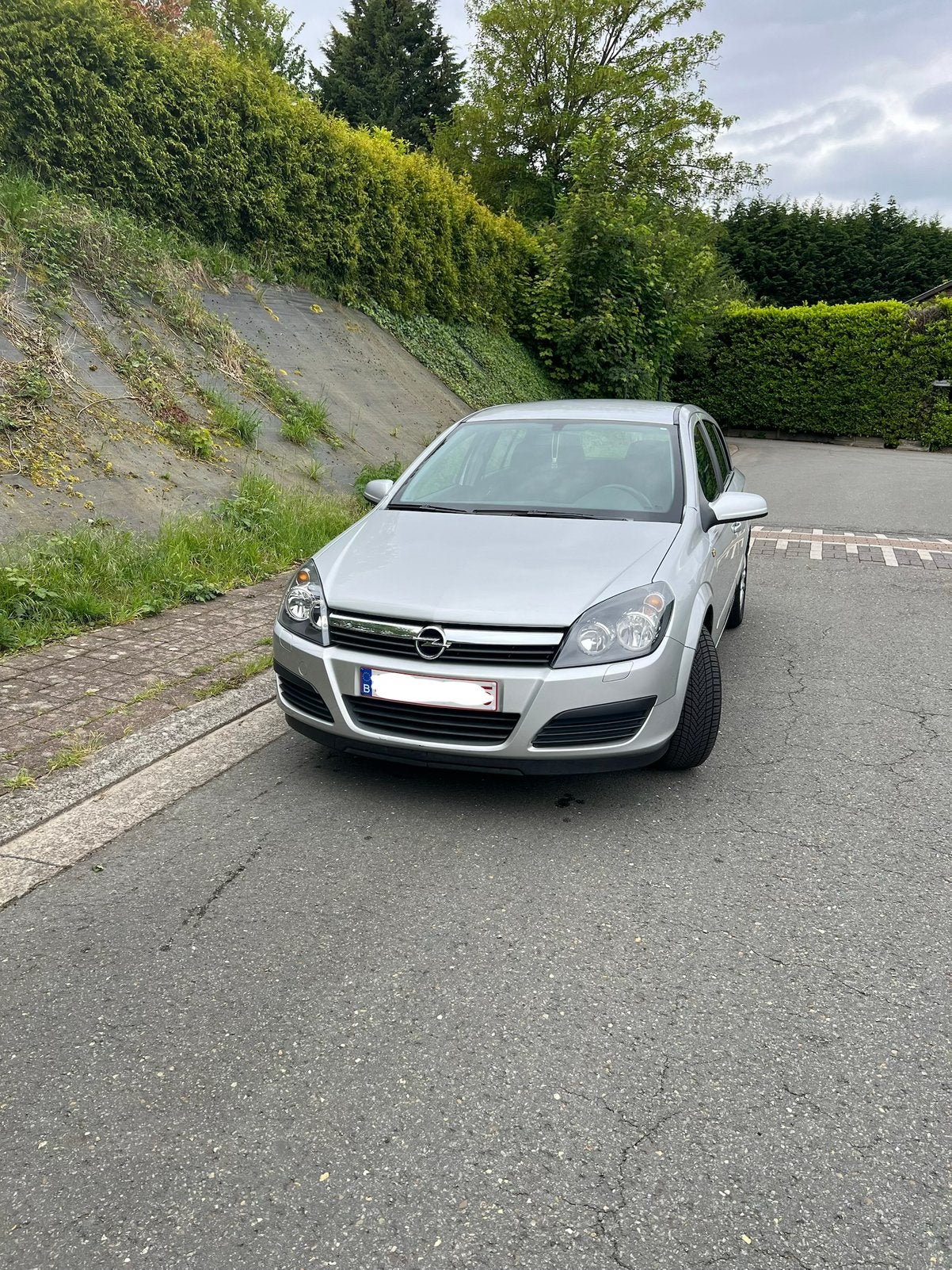 Opel astra benzine 1.4, Argent ou Gris, Achat, Carnet d'entretien, Noir