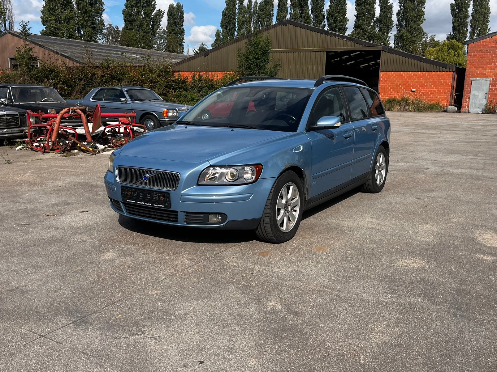 VOLVO V50 BENZINE AUTOMAT VAN 2005 MET 139DKM, Voorwielaandrijving, Parkeersensor, Zwart, Blauw